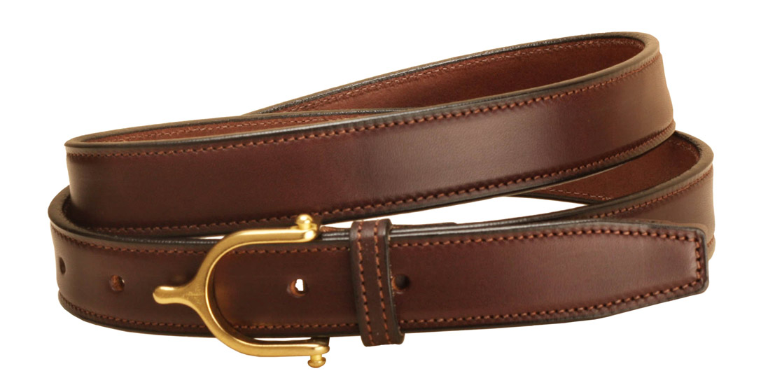 Brass English spur buckle on a 1 inch wide Havana leather belt.