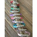 Silver sliding running pony cut design charm on a braided leather bracelet. Makes a great equestrian jewelry gift.