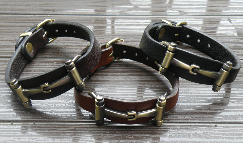 Snaffle bit leather equestrian jewelry bracelet.