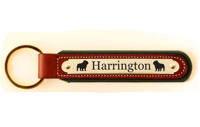 Padded leather key fob with an engraved brass nameplate with your choice of text and dog silhouette. Dog Fob