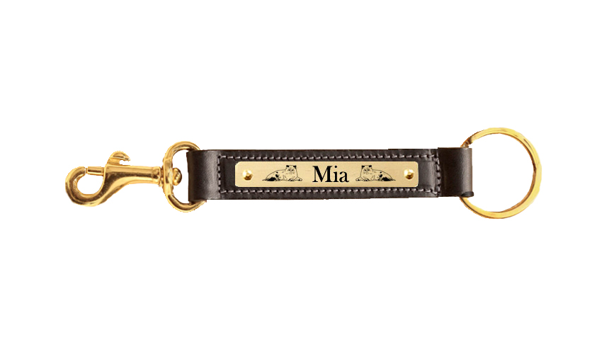Personalized leather key fob with custom engraved brass cat design nameplate and a brass snap.