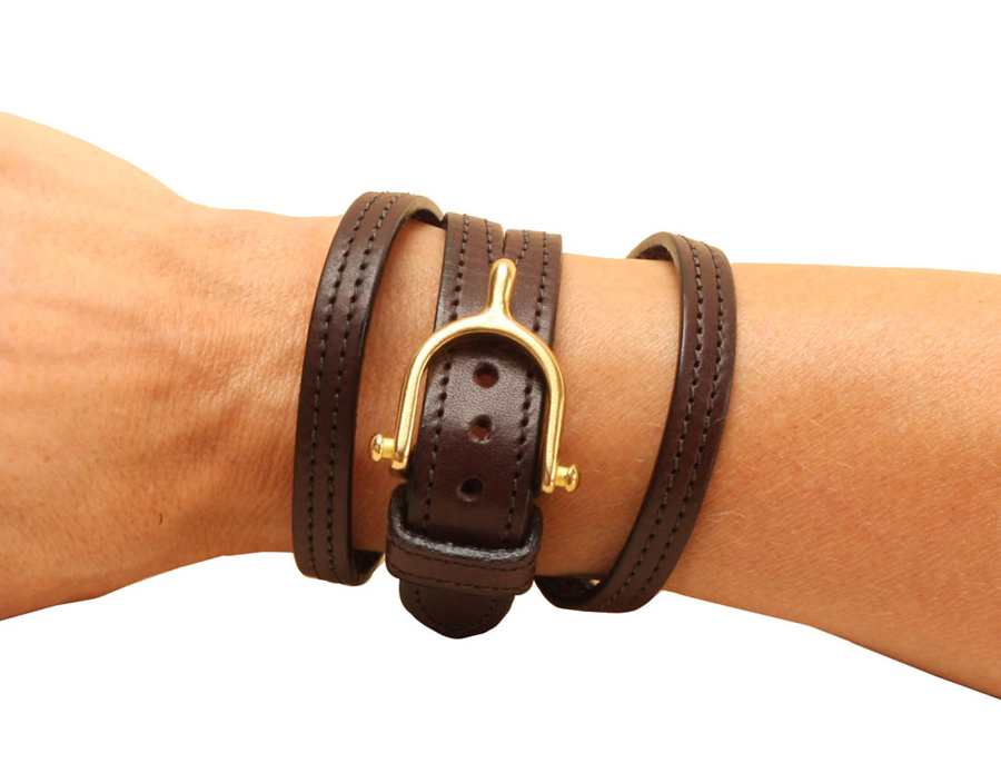 Brass English spur buckle on a leather wrap equestrian bracelet.