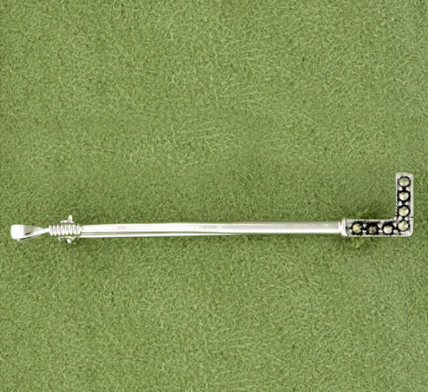 Horse whip sterling silver equestrian pin. Quality horse jewelry pin that features a riding whip.