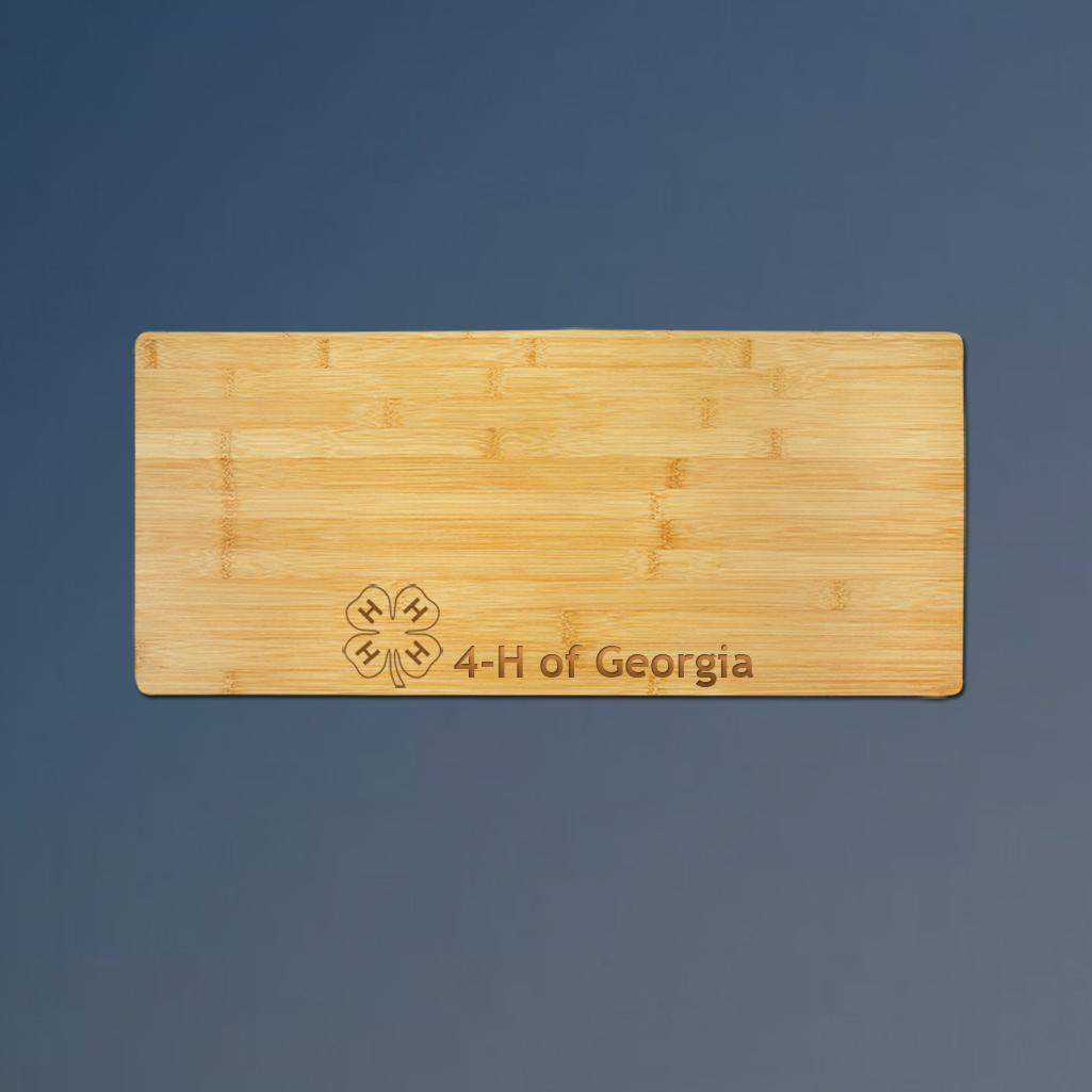 Custom engraved bamboo 4-H charcuterie board with your choice of 4-H logo and personalized text. 6+ 4-H logos to choose from.