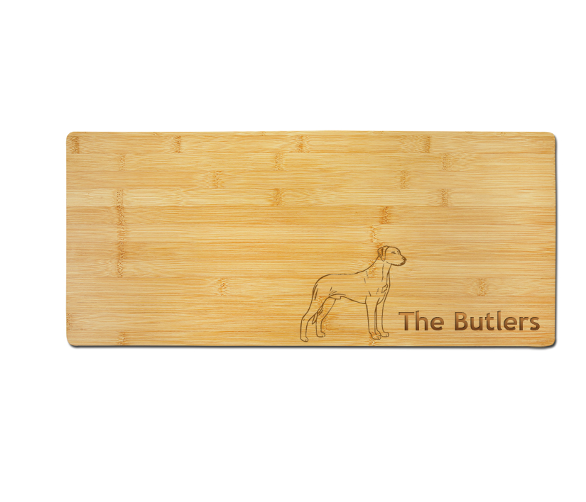 Custom engraved bamboo charcuterie board with your choice of dog design 1 and personalized text. Dog Charcuterie Board