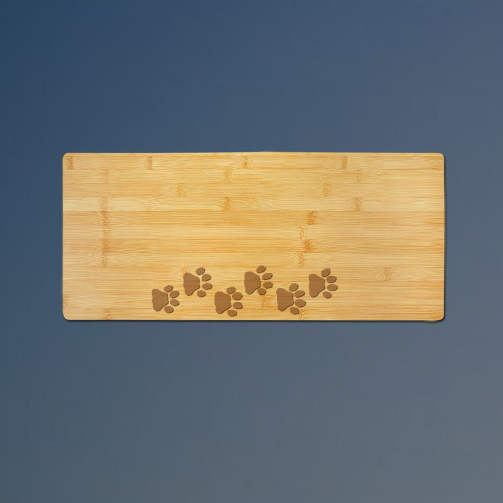 Personalized dog paw charcuterie board with your choice of dog paw design and engraved text. 35+ dog paw designs to choose from.