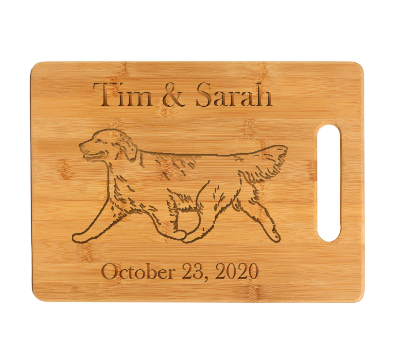 Custom engraved bamboo cutting board with personalized text and Golden Retriever dog design.