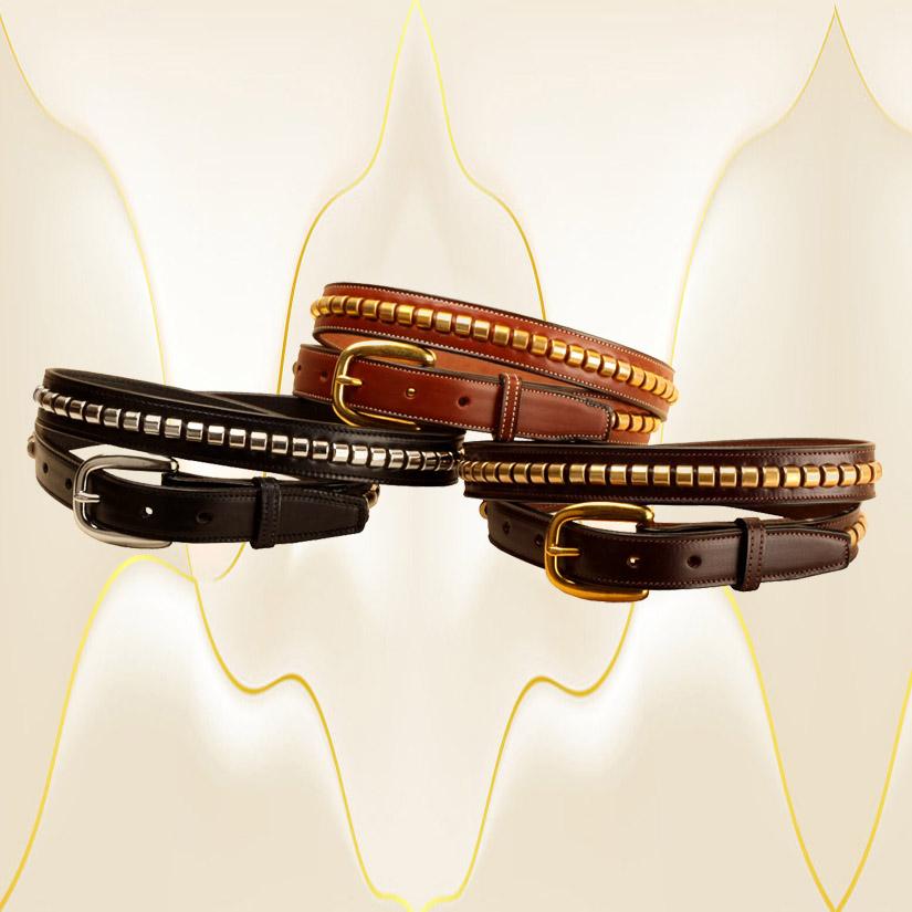 Leather belt with metal clinchers in brass or silver.