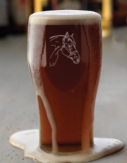 Pilsner beer glass with laser engraved horse design and text of your choice. Makes a great equestrian gift or house warming present.