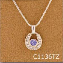 Horseshoe Necklace with a Tanzanite Stone. Adjustable equestrian horse jewelry fashion necklace.