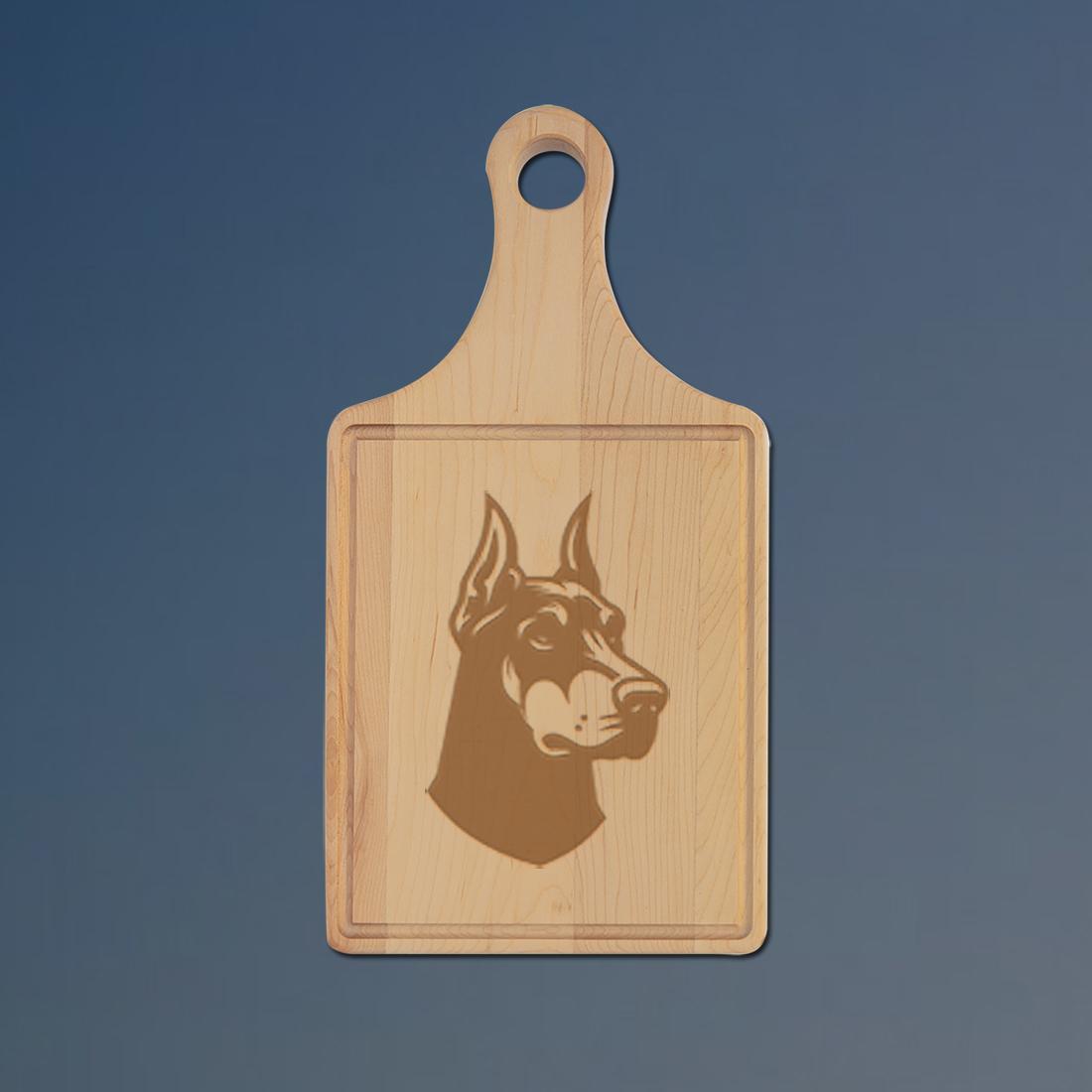 Custom engraved drip ring maple cutting board with a doberman design and personalized text. 25+ doberman designs to choose from.
