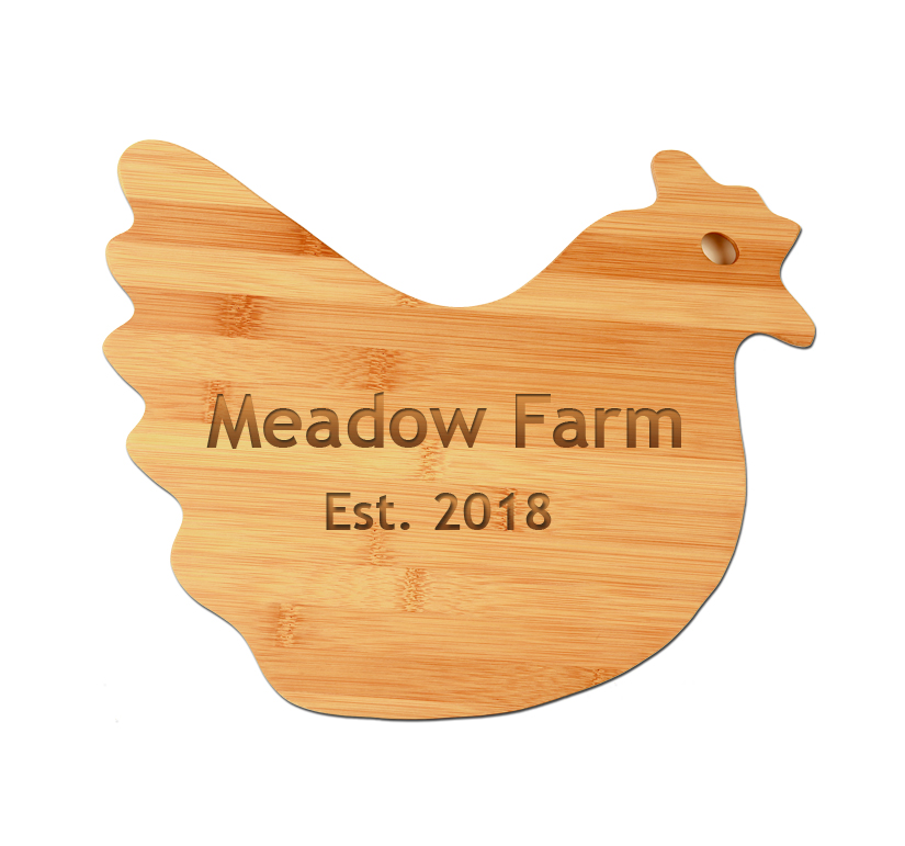 Personalized bamboo cutting board cut out in the shape of a hen come with engraved text. Chicken Cutting Board