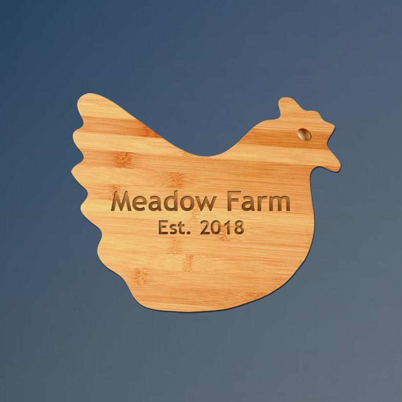 Custom engraved bamboo farm animal cutting board with farm animal design and personalized text.