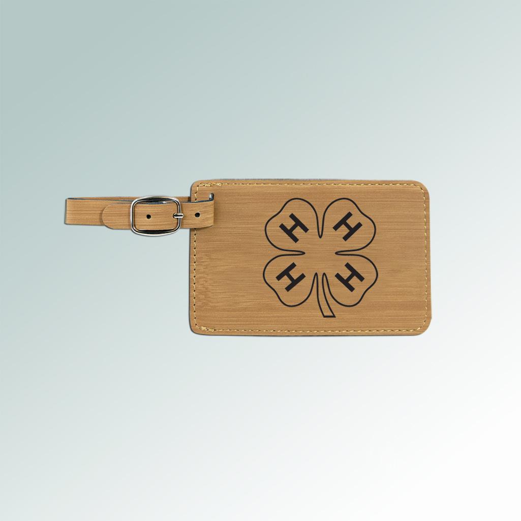 Leatherette engraved 4-H luggage tag with an encased white ID information card on the back. 6+ 4-H logos to choose from.