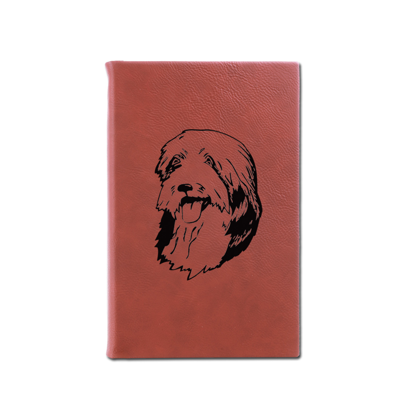 Personalized leatherette journal with custom engraved herding dog design and text.