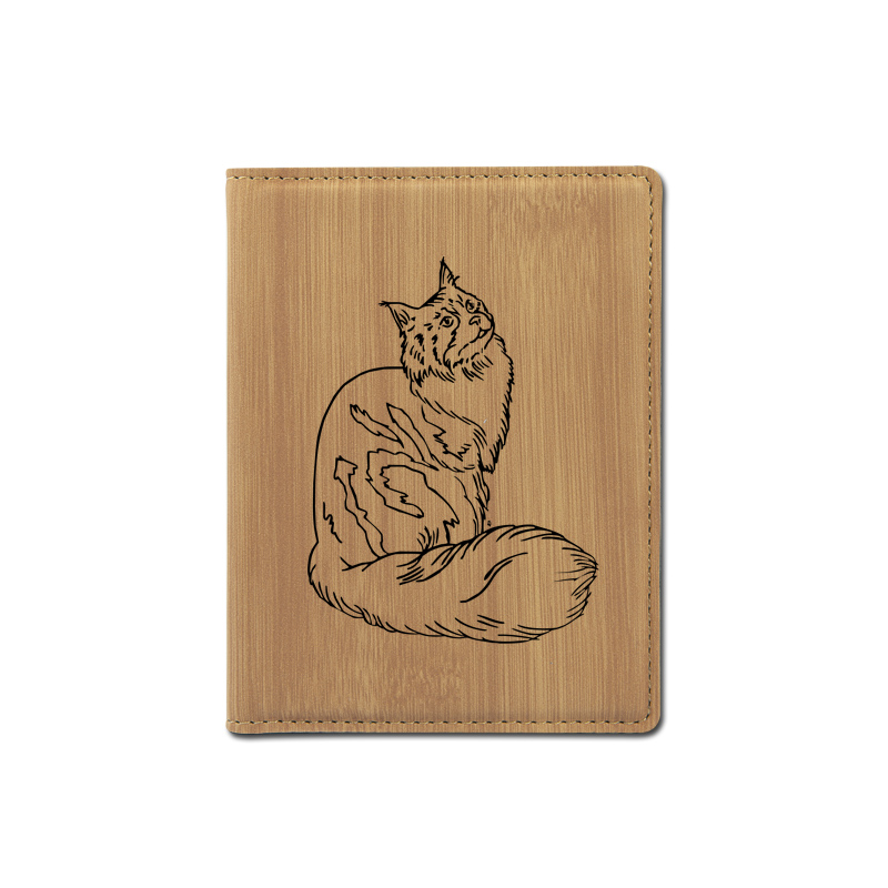 Personalized leatherette passport cover with custom engraved cat design and text.