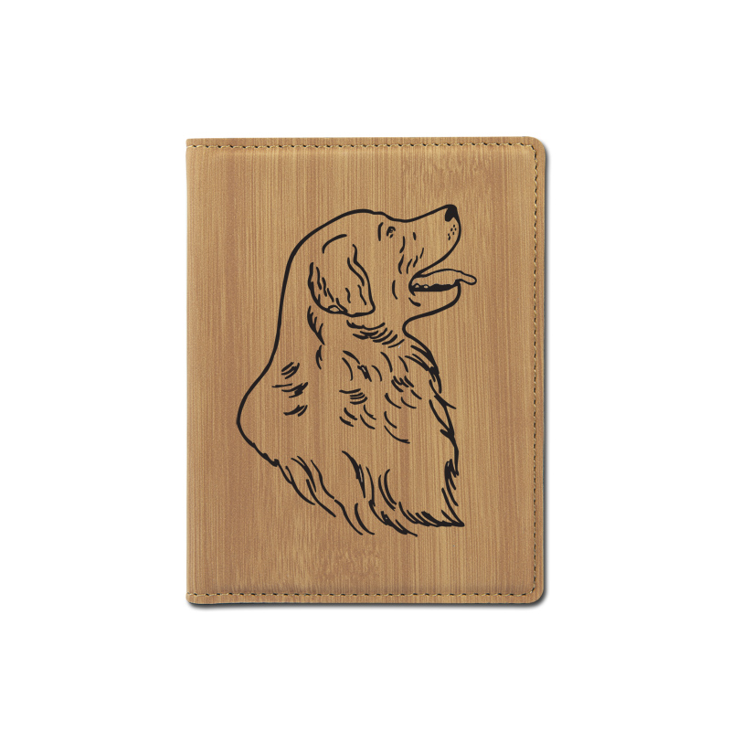 Personalized leatherette passport cover with custom engraved Golden Retriever dog design and text.