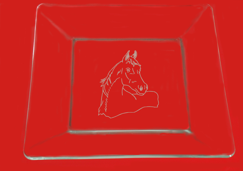 Engraved clear glass dinner plate with a custom engraved horse design and personalized text. Equestrian Plate