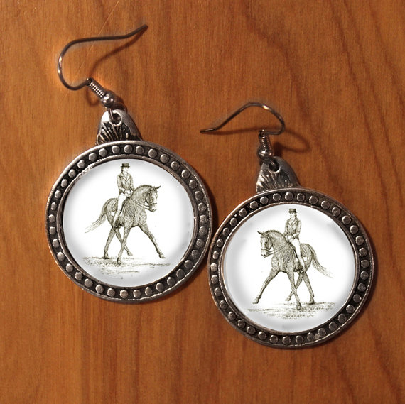 Pewter half pass dressage horse earrings.