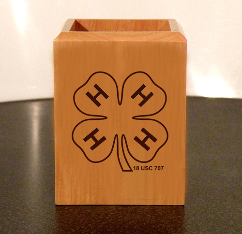 Personalized maple wood pen holder with custom engraved 4-H logo and engraved text.