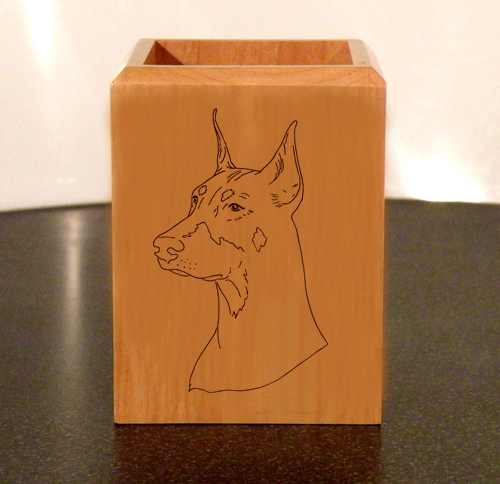 Personalized maple wood pen holder with custom engraved Doberman dog design and engraved text.