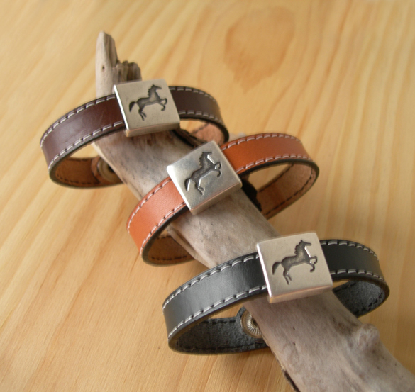 Antique silver sliding horse charm leather bracelet.