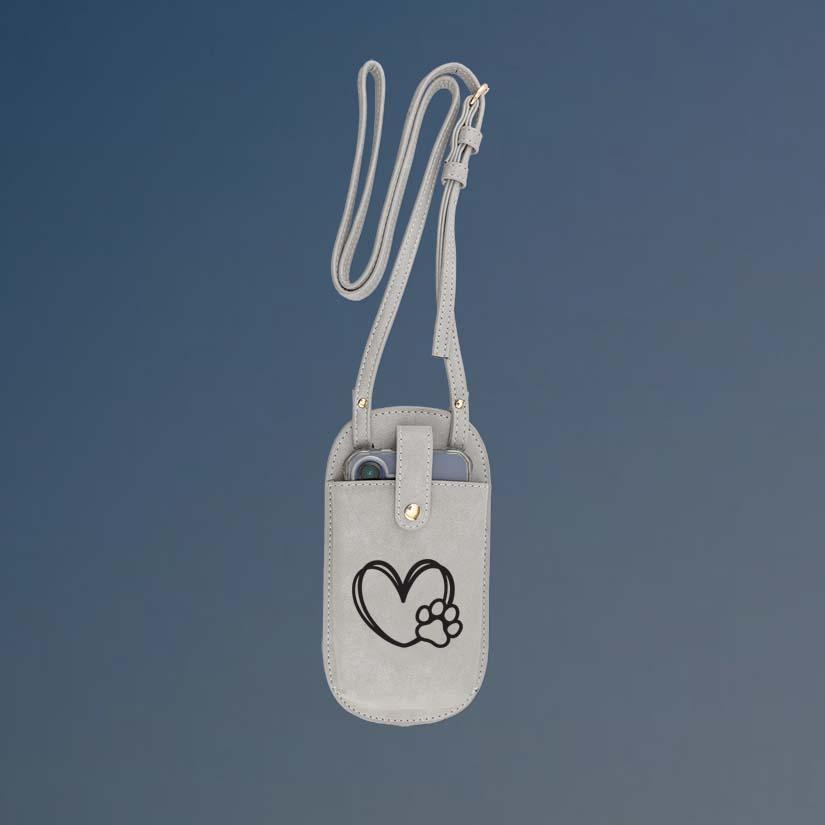 Custom engraved urban essential dog paw crossbody bag with your choice of dog paw design and personalized text.