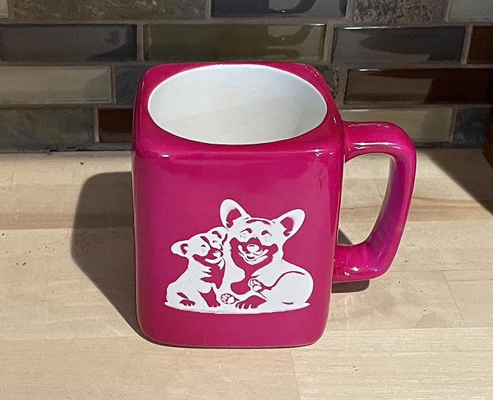 Corgi & puppy square coffee mug that has a corgi and a corgi puppy engraved on the front. Corgi Mug
