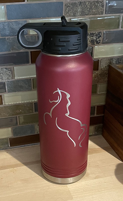 Engraved rearing horse water bottle with a decorative rearing horse.
