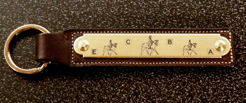 Custom engraved brass nameplate key fob with a dressage horse and rider. Dressage Gift