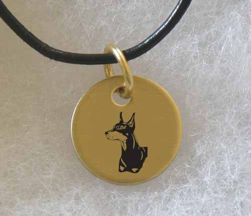 Brass charm necklace with engraved Doberman design of your choice. Doberman Necklace