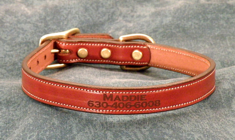 Leather dog collar padded with laser engraved text of your choice.