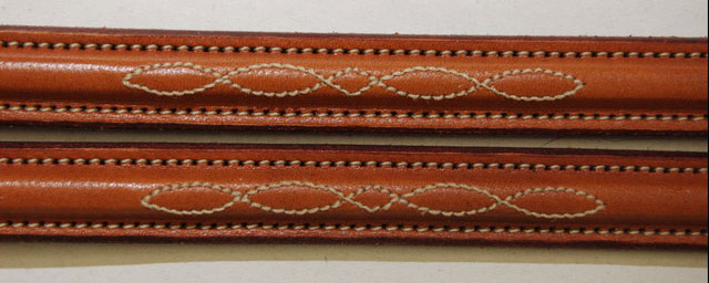 Edgewood Leather rubber reins come in three lengths and two colors choices.