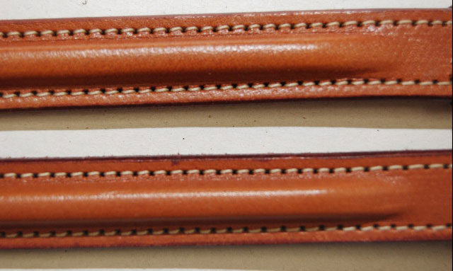 Plain raised rubber grip 5/8" leather horse reins.