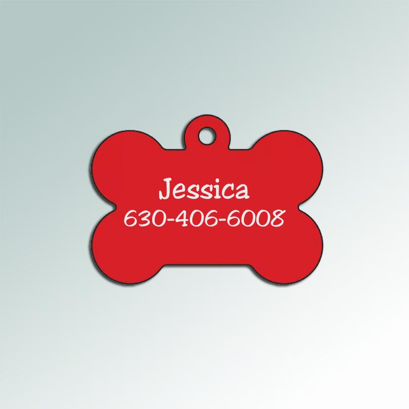 Engraved text is done on the back of the dog bone ID tag.
