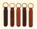 Padded leather key fob that comes standard with an engraved brass nameplate.