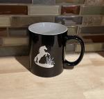 Ceramic round coffee mug with a rearing horse engraved on the front. Horse Mug