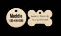 Engraved brass circle or dog bone shaped hang down dog id tag with personalized text..