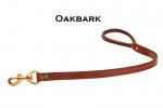 Oakbark leather dog leash with a rolled handled and solid brass hardware.