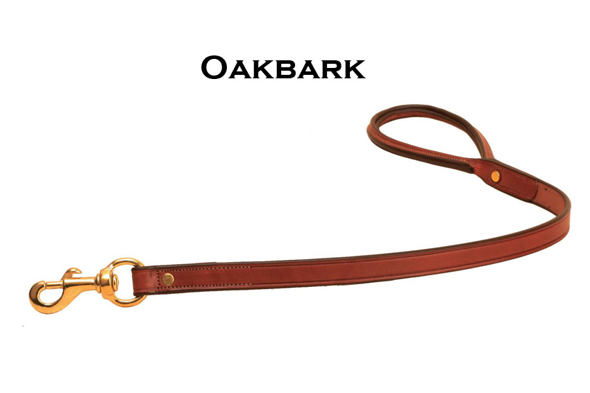 Oakbark leather dog leash with a rolled handled and solid brass hardware.