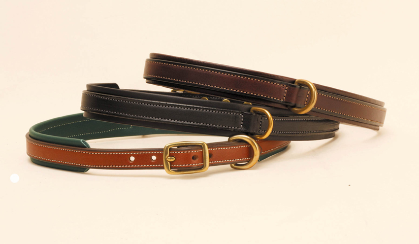 Padded leather dog collar with solid brass center dee for easier leash attachment.