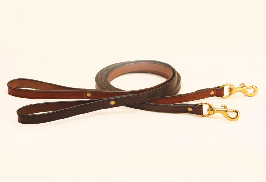Tory flat creased leather dog leash with solid brass hardware.