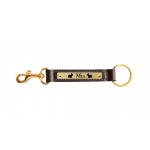 Leather nameplate key fob with brass snap and custom engraved dog design. Dog Key Fob