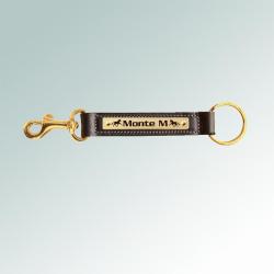 Personalized horse silhouette brass nameplate on a leather key fob with a brass bolt snap.