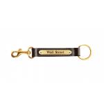 Personalized brass nameplate on a leather key fob with a brass bolt snap. Nameplate Snap Fob