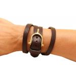Brass English spur buckle on a leather wrap equestrian bracelet.