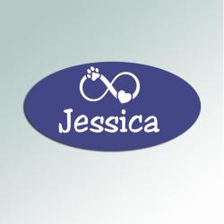 Personalized engraved plastic oval dog paw crate / kennel tags with engraved dog paw design and engraved text. Dog Paw Kennel Tag