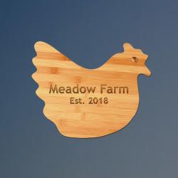 Custom engraved bamboo farm animal cutting board with farm animal design and personalized text.