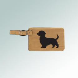 Leatherette engraved dog breed luggage tag with an encased white ID information card on the back. 100+ dog breeds to choose from.