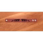 Horse jewelry bracelet made out of leatherette and custom engraved with a decorative horse design. Equestrian Jewelry